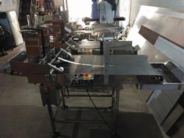 APM Automated Carton Feeder with Conveyor