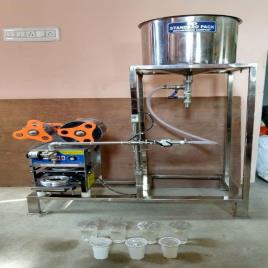Automated Curd Cup Filler and Sealer