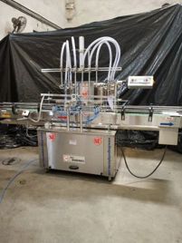 Four Head Phenyl Filling Machine