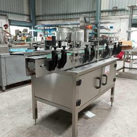Automated Round Bottle Labeling Machine