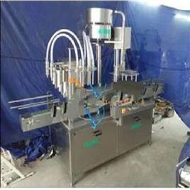 Quad Head Liquid Bottle Filler Capper Machine