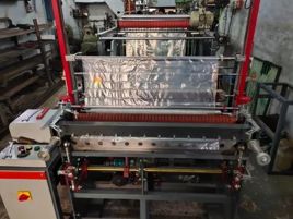 Ravi Engineering Fully Automated Single Decker Carry Bag Machine