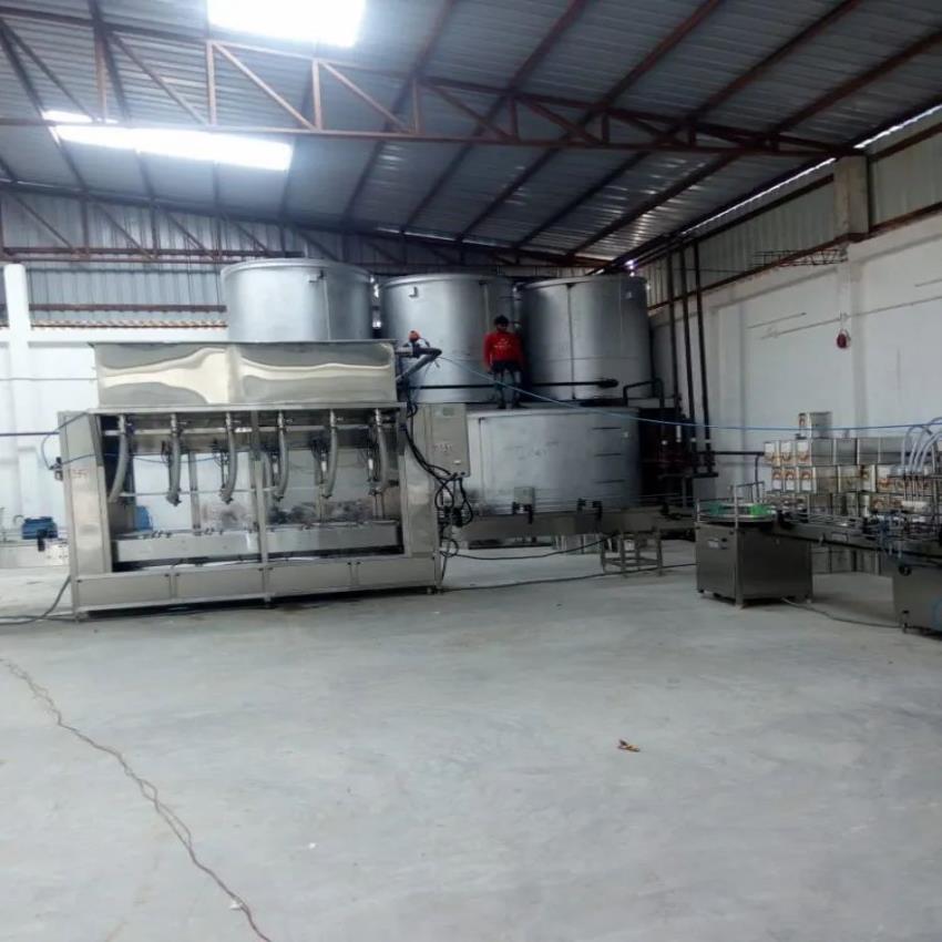 Automatic Liquid Filling and Capping Machine