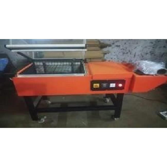 SHRINK WRAPPING MACHINE